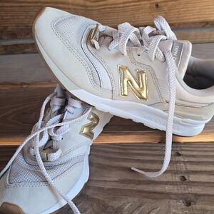 New Balance Cream and Gold Sneakers